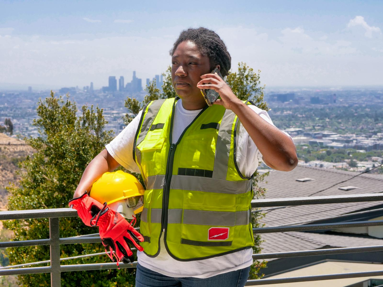 Trade professional checking incoming jobs on their phone
